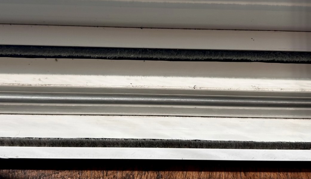 Window tracks after cleaning by Sparkle & Shine